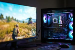 Игровой компьютер с подсветкой и монитором с открытым игровым миром